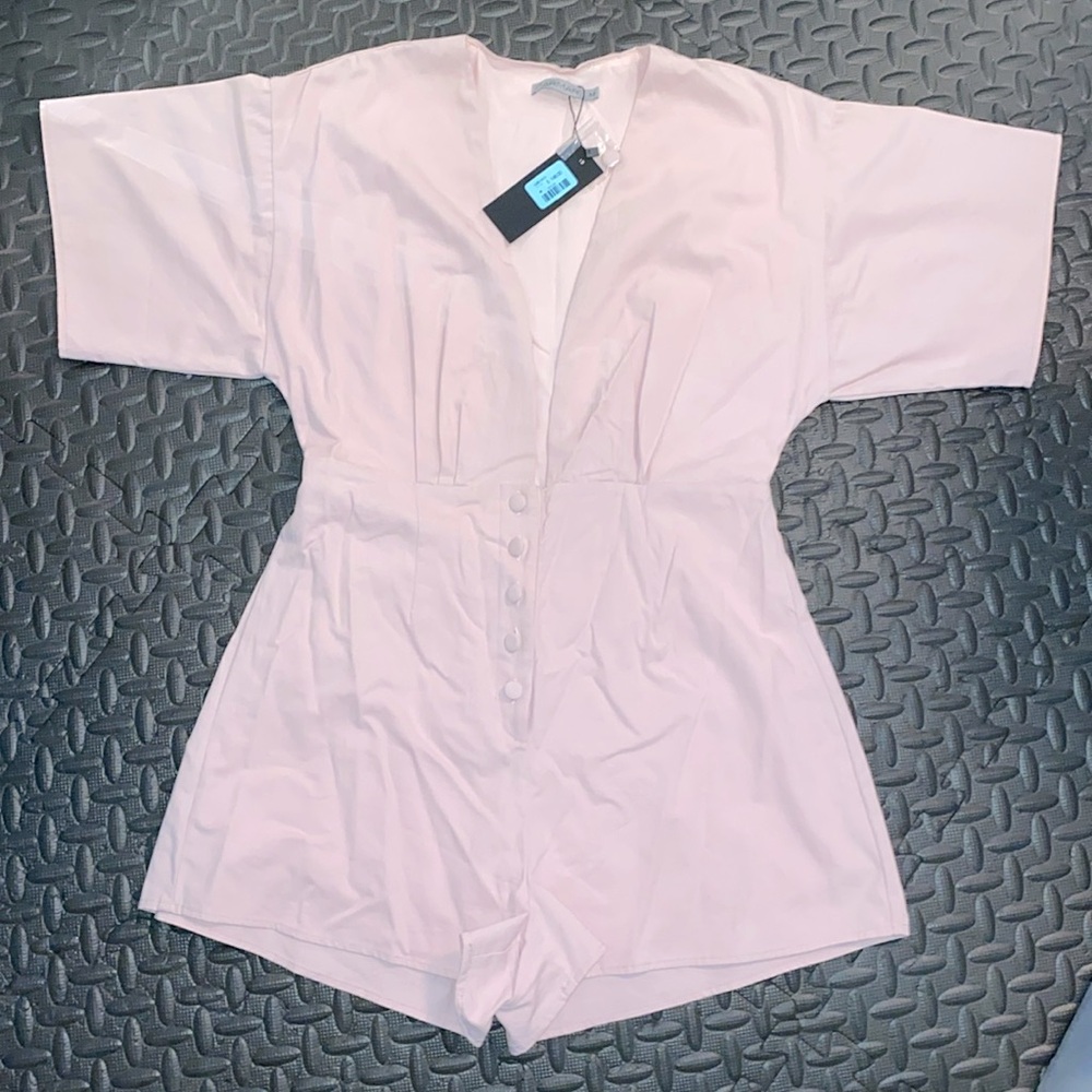 NWT. Carmar. LITE PINK Jumper. SIZE M. Very cute. Smoke and pet  free home.